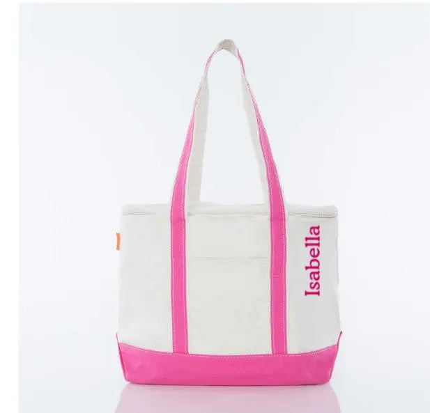 Personalized white tote bag with pink handles and bottom, embroidered name on front