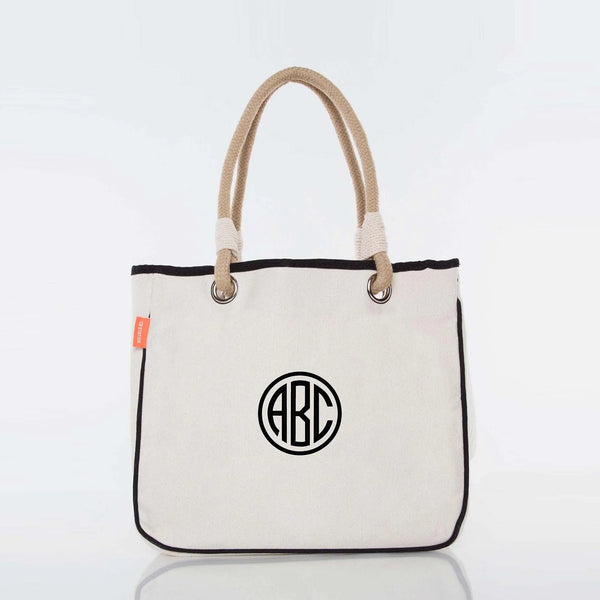 Personalized canvas tote bag with rope handles and black circle monogram design