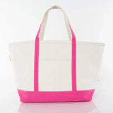 Canvas tote bag with pink handles and trim, front pocket, on a white background.