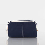 Navy blue canvas toiletry bag with white trim, front view, on white background