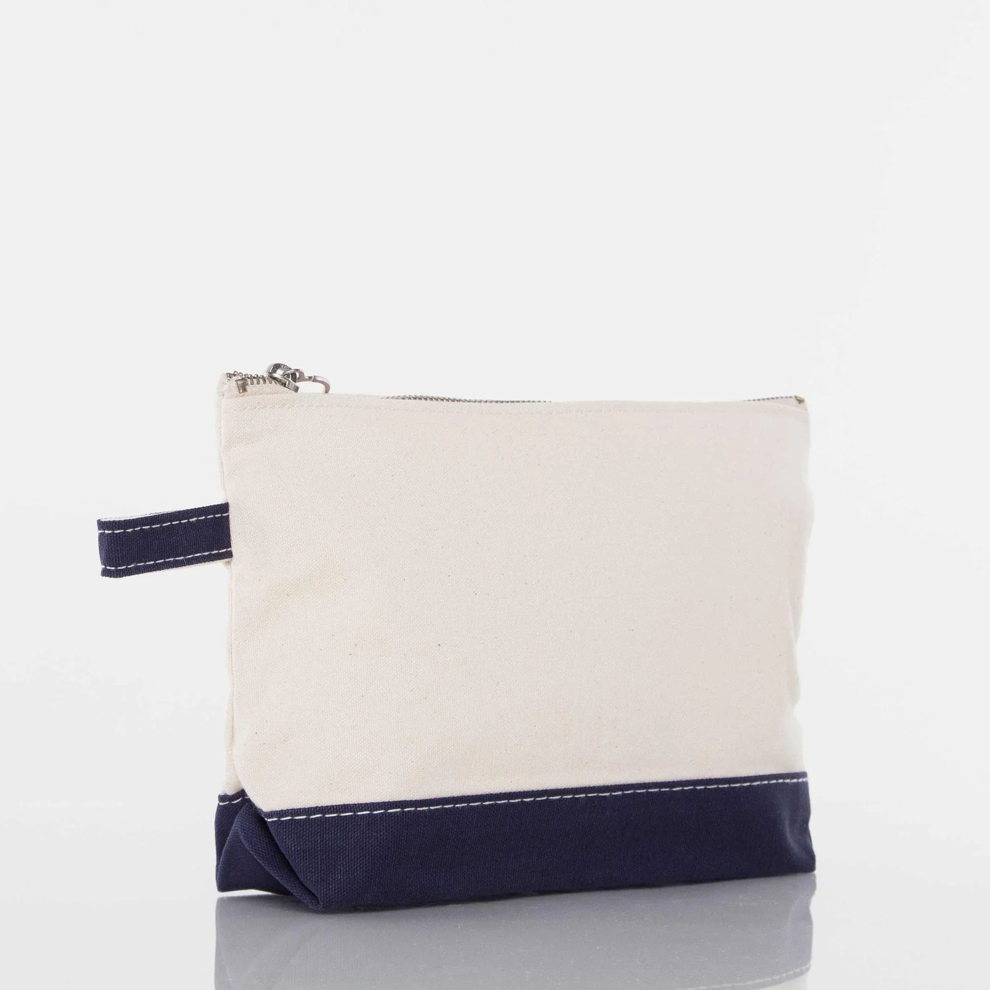 Canvas zippered pouch with navy bottom and side handle, plain and unembellished