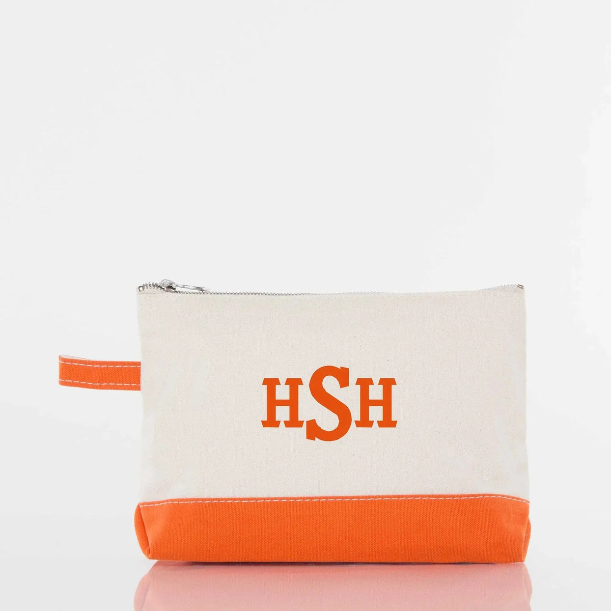 Personalized monogram canvas pouch with orange trim and zipper, custom embroidered accessory bag