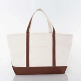 Canvas tote bag with brown trim and handles, reusable shopping or accessory bag