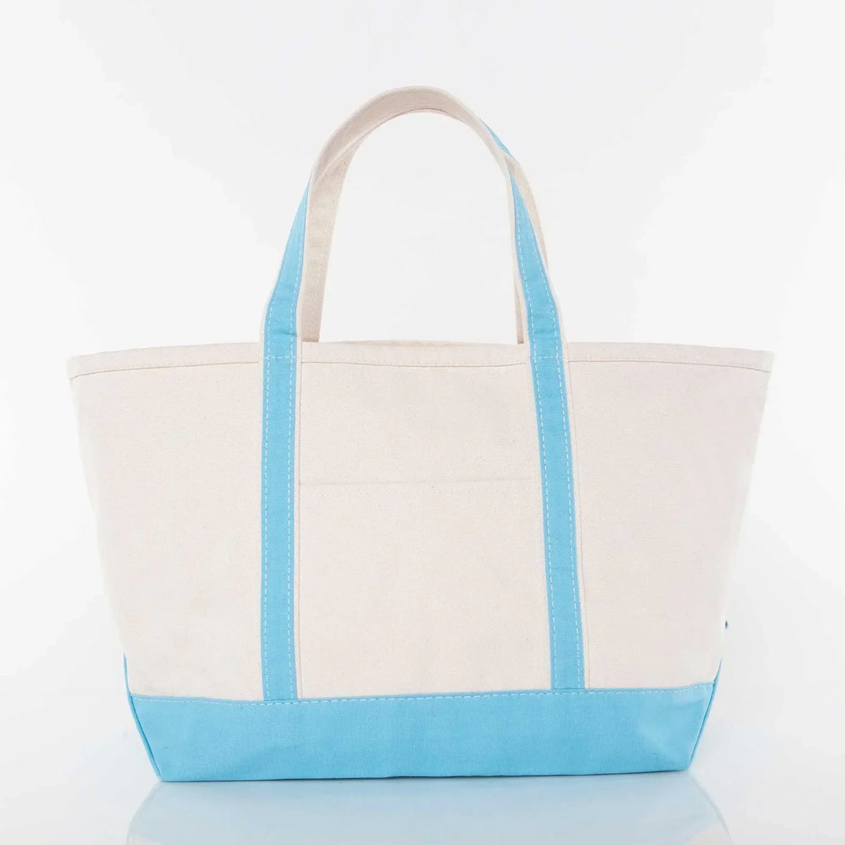 Large canvas tote bag with blue handles and bottom, perfect for custom embroidery gifts