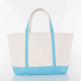 Large canvas tote bag with blue handles and bottom, perfect for custom embroidery gifts