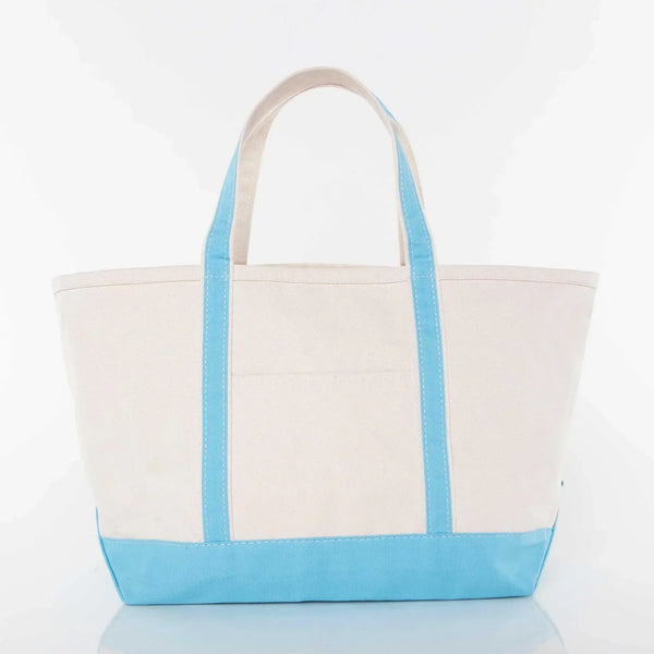 Large canvas tote bag with blue handles and bottom, perfect for custom embroidery gifts