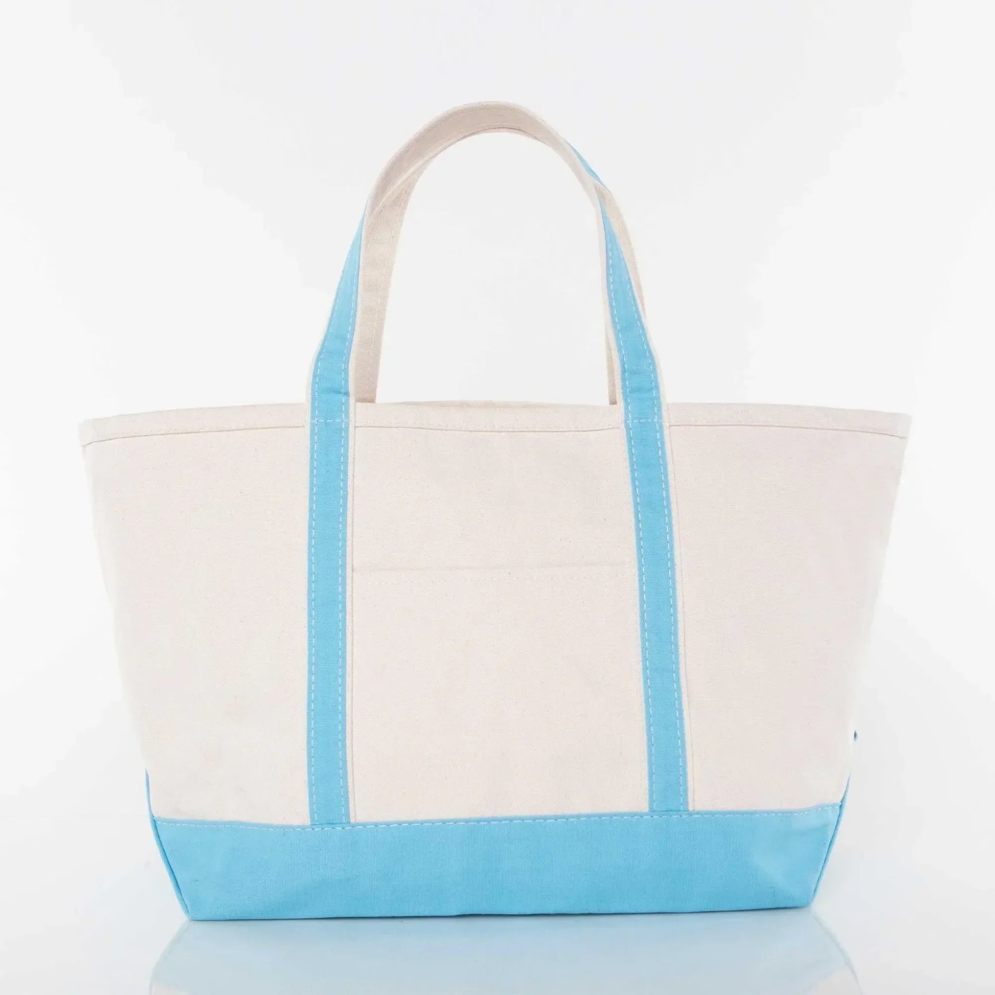 Large canvas tote bag with blue handles and bottom, perfect for custom embroidery gifts