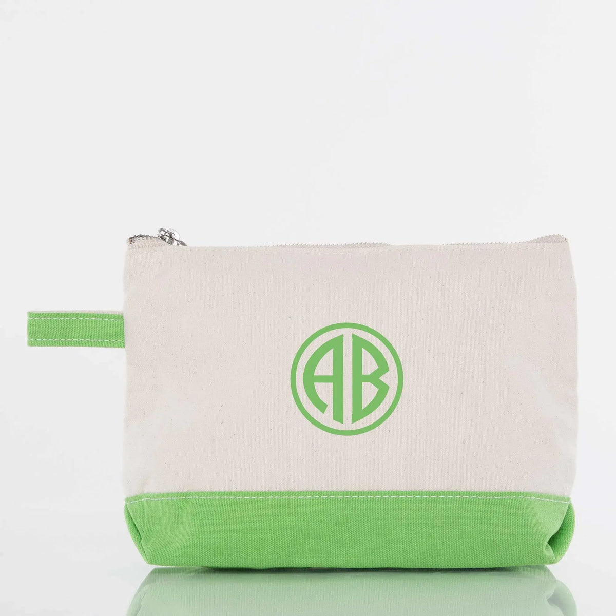 Personalized monogram canvas zipper pouch with green trim and initials AB