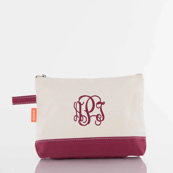 Personalized monogrammed canvas pouch with burgundy accent and zipper closure