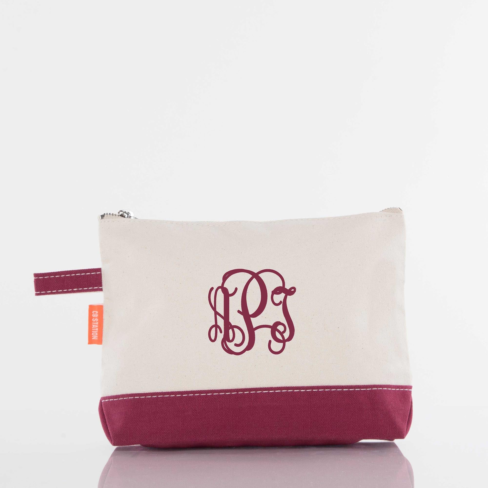 Canvas zip pouch with burgundy monogram and matching bottom accent, personalized gift bag