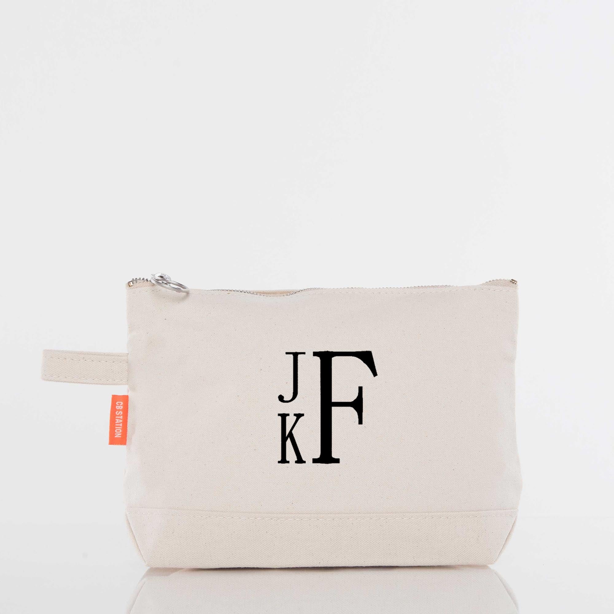 Beige canvas zip pouch with black monogram initials, personalized embroidered accessory bag