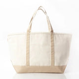 Large canvas tote bag with front pocket and beige bottom, blank for custom embroidery.
