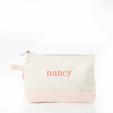 Personalized canvas zipper pouch with 'nancy' embroidered in pink, custom embroidered bag