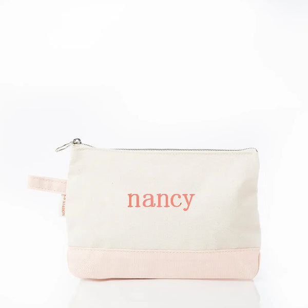 Personalized canvas zipper pouch with 'nancy' embroidered in pink, custom embroidered bag