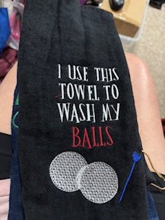 I use this towel to wash my balls black golf towel
