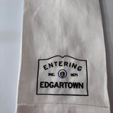 Linen hemsttiched kitchen towel embroidered with Entering Edgartown town sirn