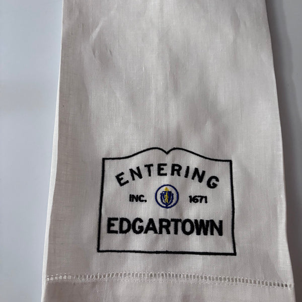 Linen hemsttiched kitchen towel embroidered with Entering Edgartown town sirn