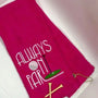 Red embroidered golf towel with 'Always On Par' text, golf tee and clip included.