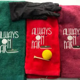 Tri-fold golf towels with 'Always On Par' embroidery, glove, yellow golf ball and tee