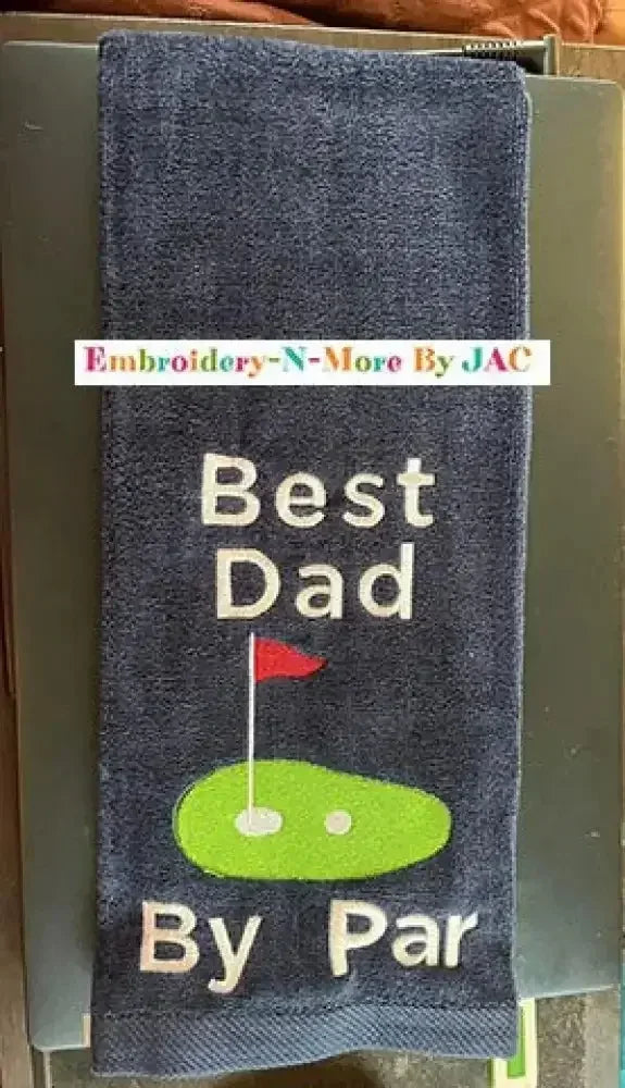 Embroidered golf towel with 'Best Dad By Par' text and golf green design, gift for dads