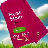 Pink embroidered golf towel with 'Best Mom by Par' text, golf green graphic, and two tees