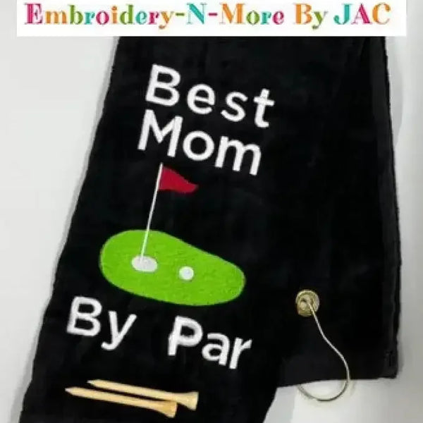 Black golf towel with embroidered 'Best Mom By Par', golf green design, and golf tee attached
