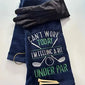 Navy embroidered golf towel with humorous 'Can't Work Today I'm Feeling Under Par' text, glove, and tees