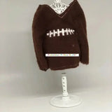 Brown elf sweater styled like a football with white embroidered stitching on display stand