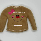 Cute brown elf sweater with embroidered gingerbread girl face and pink bow design