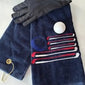 Navy golf towel with USA flag embroidery, golf glove, and ball, perfect personalized gift