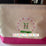 Canvas golf-themed makeup bag with pink trim, personalized embroidered monogram N