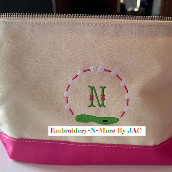 Canvas golf-themed makeup bag with pink trim, personalized embroidered monogram N