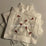 White cocktail napkin set with red lobster embroidery and hemstitch border