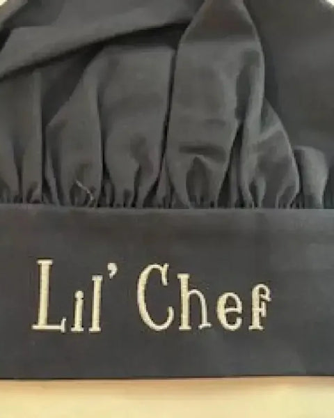 Personalized black child chef hat with Lil' Chef embroidered on the front