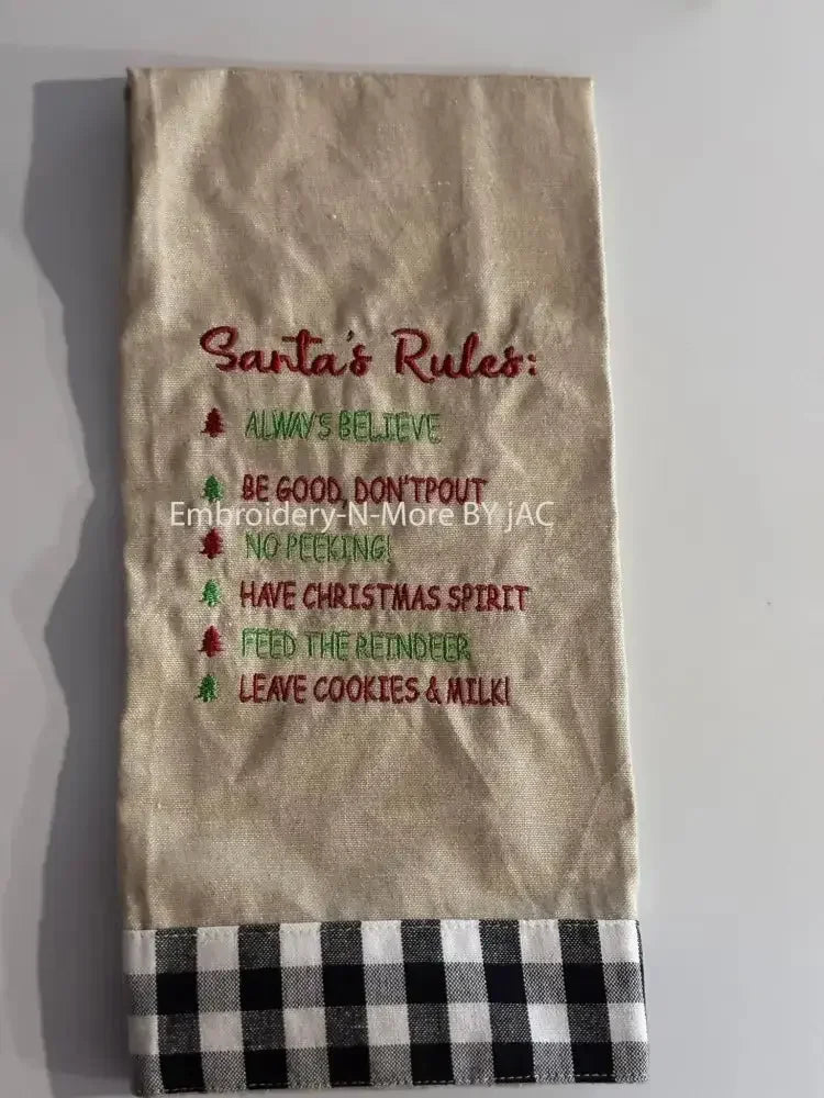 Embroidered Christmas oatmeal hand towel with Santa's Rules and buffalo plaid border