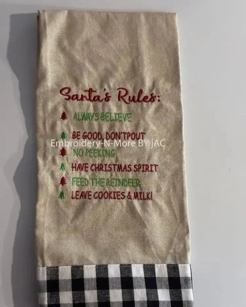 Embroidered Christmas oatmeal hand towel with Santa's Rules and buffalo plaid border