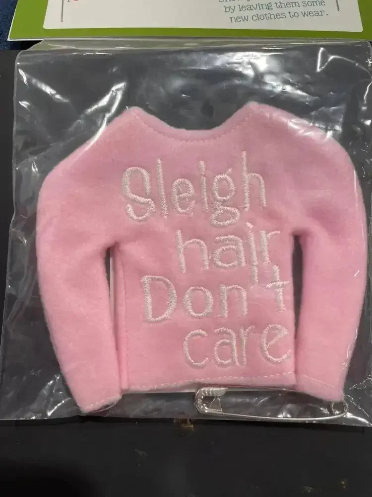 Pink elf sweater with 'Sleigh hair Don't care' embroidered, festive holiday accessory