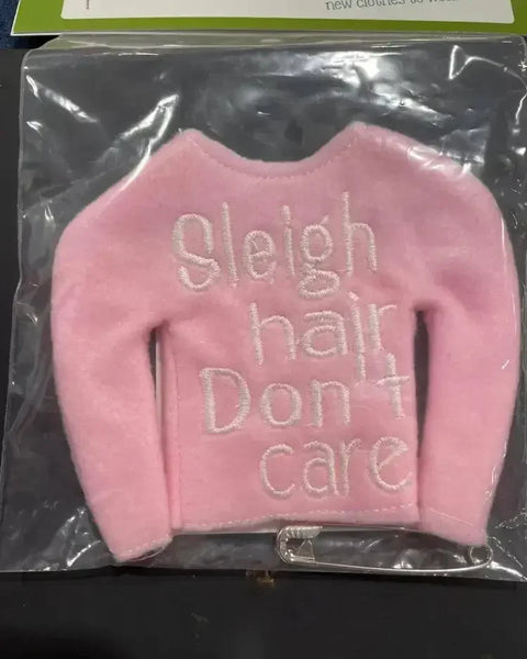 Pink elf sweater with 'Sleigh hair Don't care' embroidered, festive holiday accessory