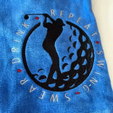Blue personalized golf towel with embroidered golfer silhouette and Swing Swear Drink Repeat text